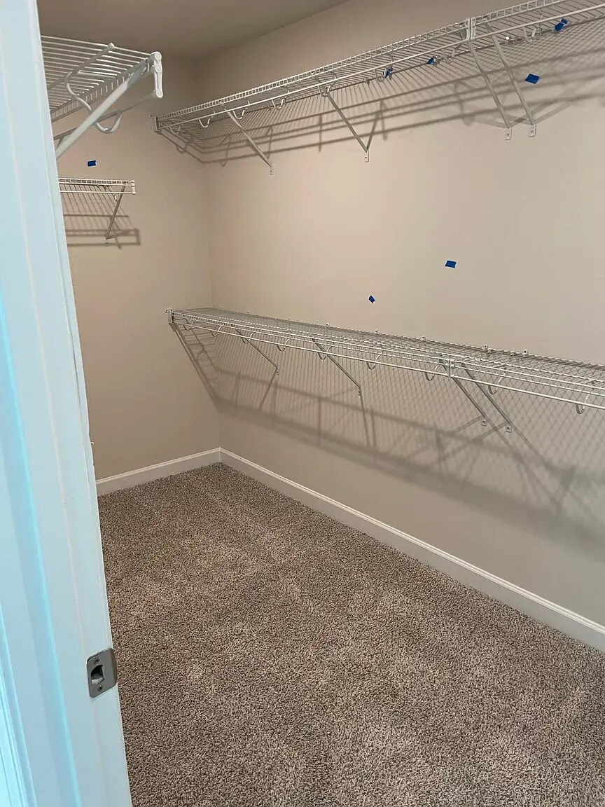 Primary bedroom closet - 2511 Greenmarket Dr