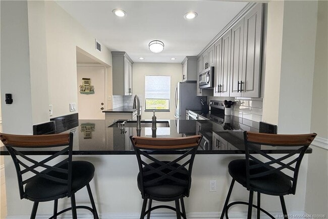 Building Photo - 1950 SW Palm City Rd