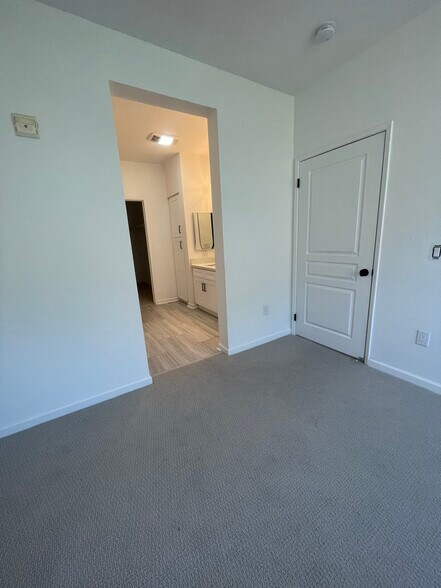 Primary bedroom and bath suite - 1 Crescent Way