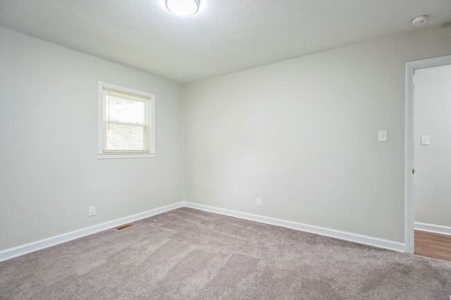 Building Photo - 4BR Brick Ranch with Upgrades & Room to Feel at Home!