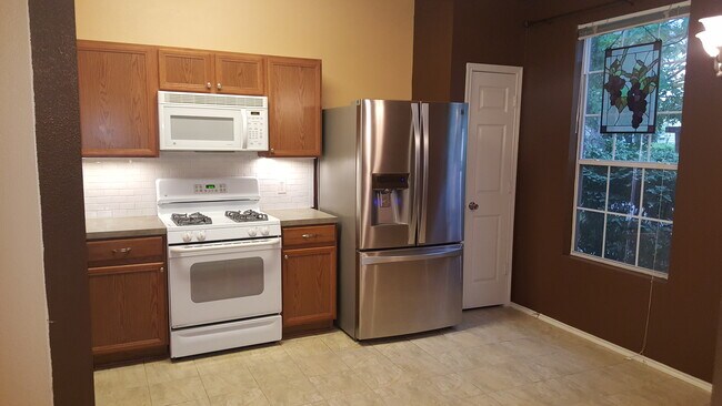 Breakfast Room * Either Both Formals(or one large Formal Dining); Great Kitchen with Corian countert - 23631 Twisting Falls Drive