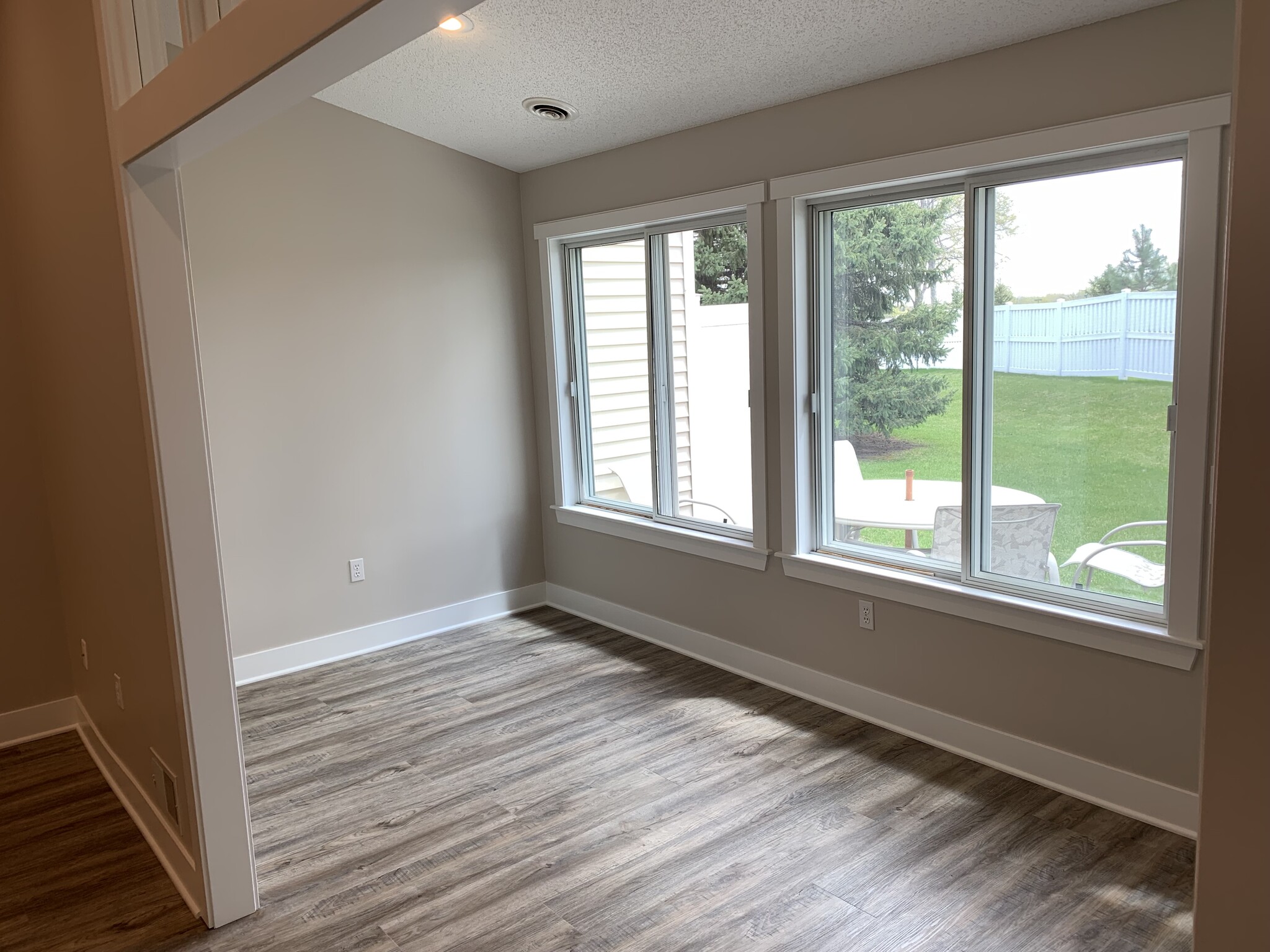 Sunroom looks out on "private" back yard - 9057 Prairieview Ln N