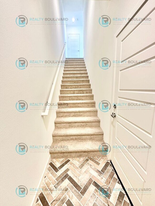 Building Photo - Modern 2 Bedroom 2Bath Townhome with Dual Patios & Designer Finishes near Truckee River