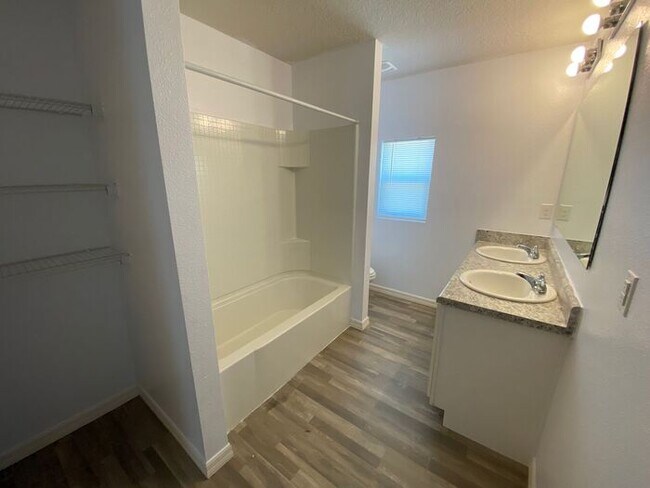 Building Photo - Four Bedroom / Three Bath Home