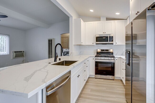 Building Photo - West 11th Avenue Apartment Homes