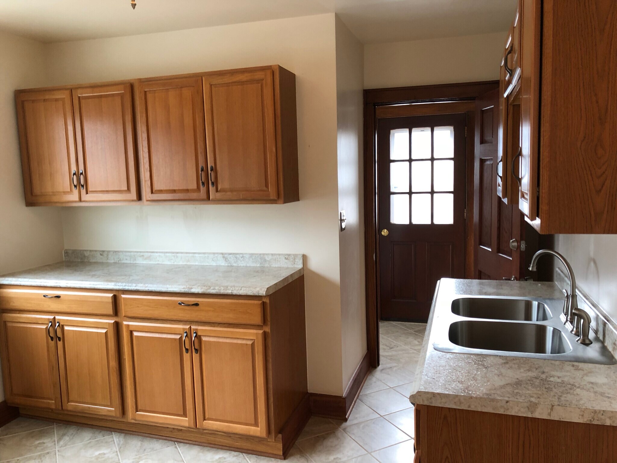 view into kitchen from dinning room. - 623 S 60th St