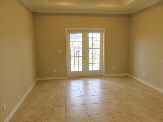 Building Photo - 8828 Tropical Palm Dr