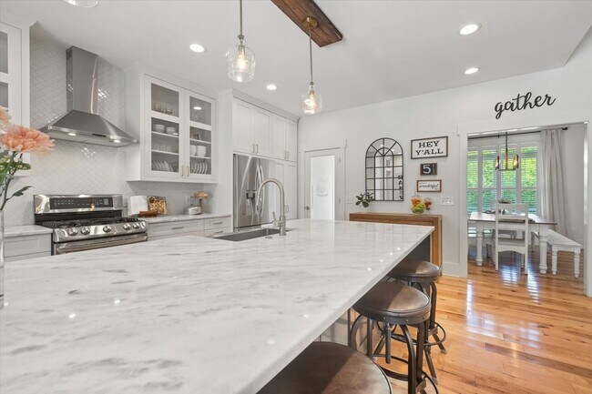 Building Photo - unning custom-built home on a full acre in...