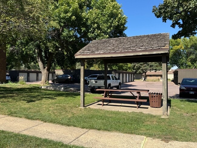Building Photo - 2BR Condo Near Empire Mall with Garage, Pool & Easy Interstate Access!