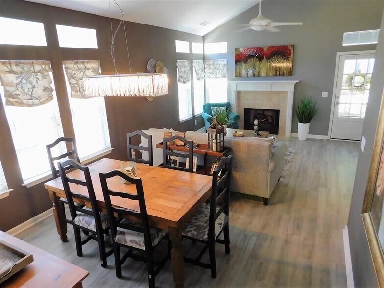 dining area looking into living room, gas fireplace - 351 Pinehurst Way