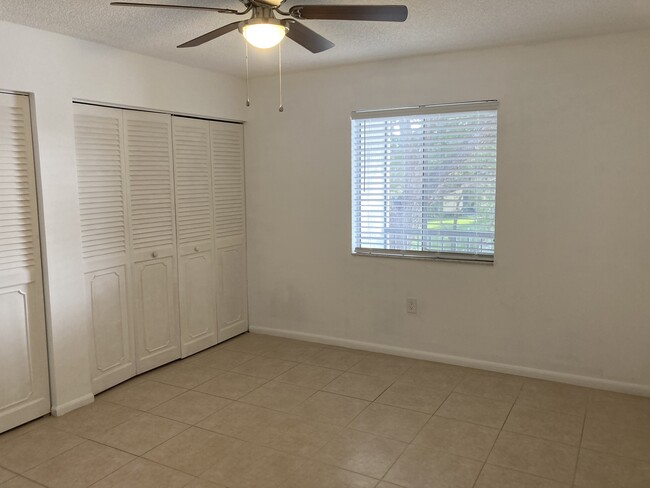 Bedroom with lake view - 824 SW 9th Street Cir