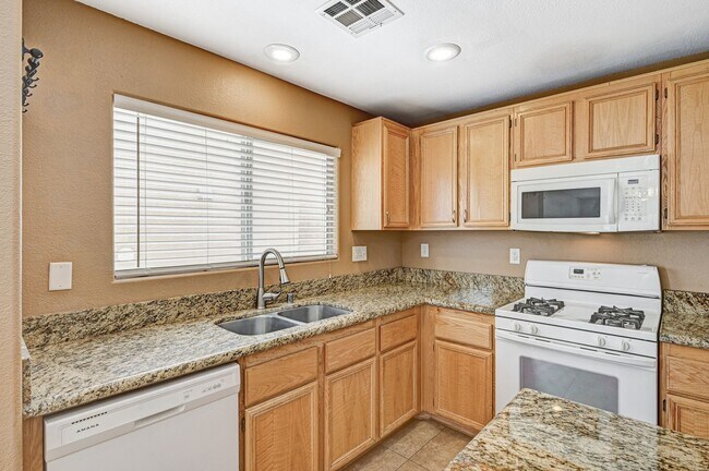 Building Photo - Quaint two-story home in a gated Las Vegas...