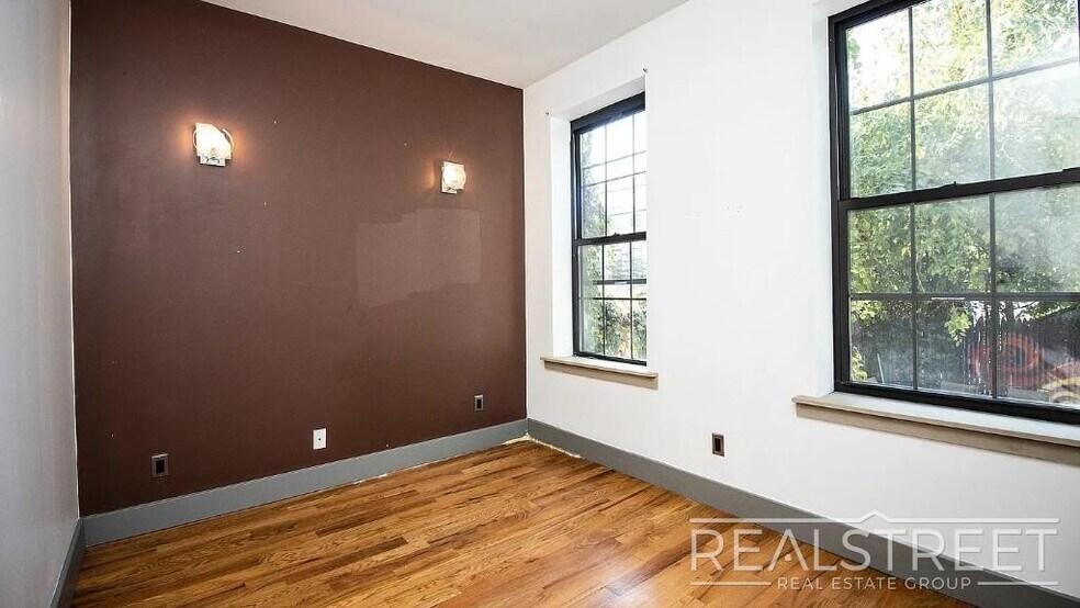 Building Photo - Gut-Renovated 3BR + Massive Finished Basement | Backyard, Laundry & HVAC | Bushwick