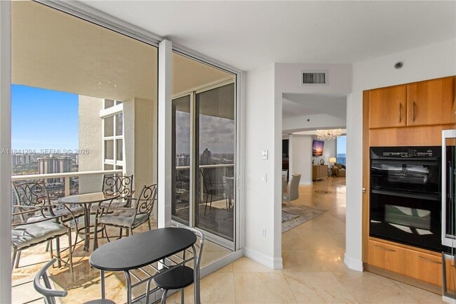 Building Photo - 19111 Collins Ave