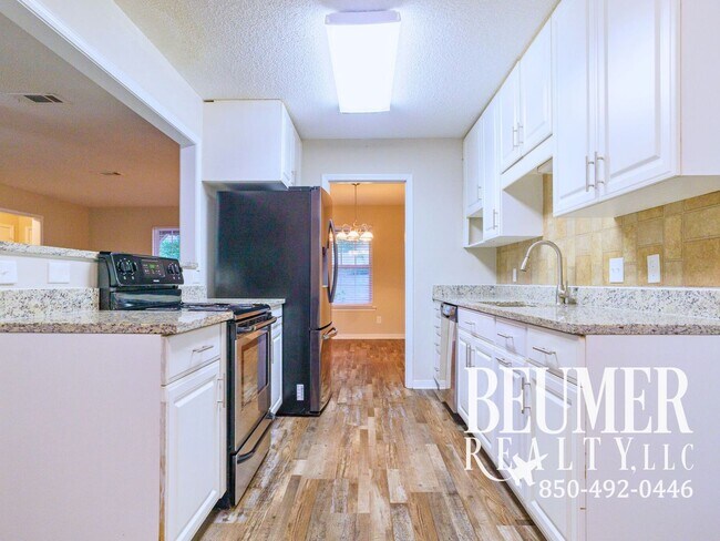 Building Photo - Charming Corner Haven 4BR/3BA Brick Home for Rent