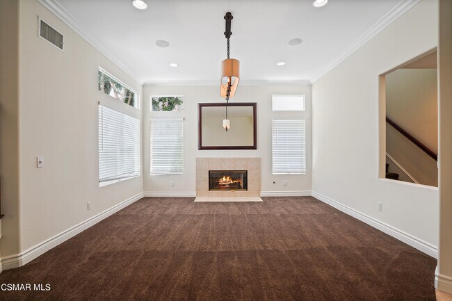 Building Photo - 6077 Mandeville Pl