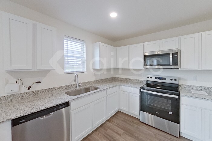 Building Photo - 7016 Peppermill Way