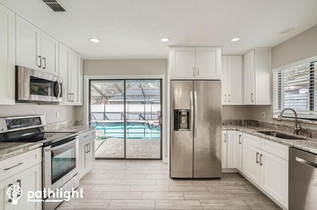 Primary Photo - 9406 Pebble Glen Avenue, Tampa, FL, 33647