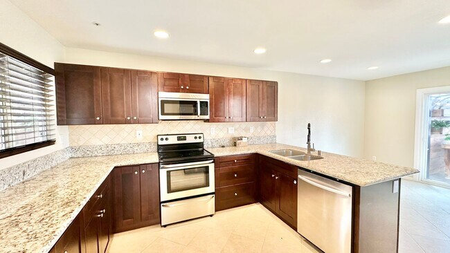 Building Photo - Beautifully Updated and Upgraded Two-Story...