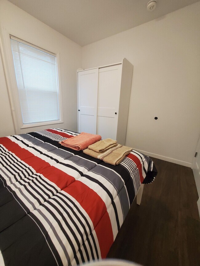 Queen Bed #2 and closet - 87 Vinton St