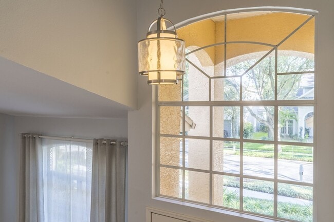 Building Photo - Beautiful 4/2 home Located on a tree lined street in the gate of country club community of the Hu...