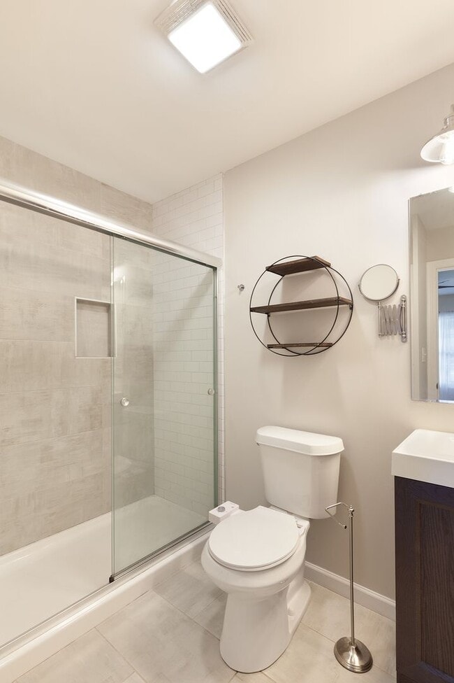 Building Photo - Renovated 3/2 w/ Fenced In Backyard and Courtyard!