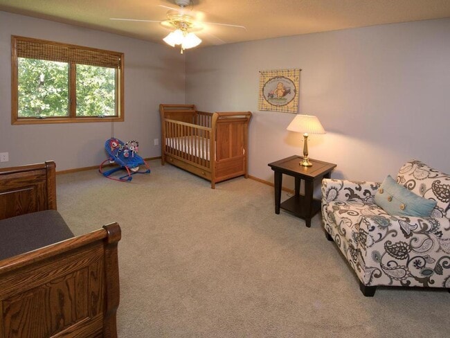 Building Photo - Elegant 2-Story has 4 BRs on Upper Level, Office, 2 Family Rooms, Fireplace & More!