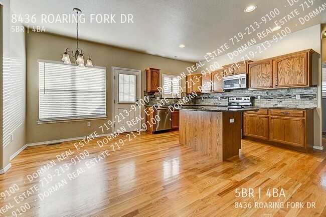 Building Photo - 8436 Roaring Fork Dr