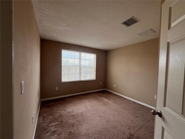 Building Photo - 8315 Deerland Bluff Ln