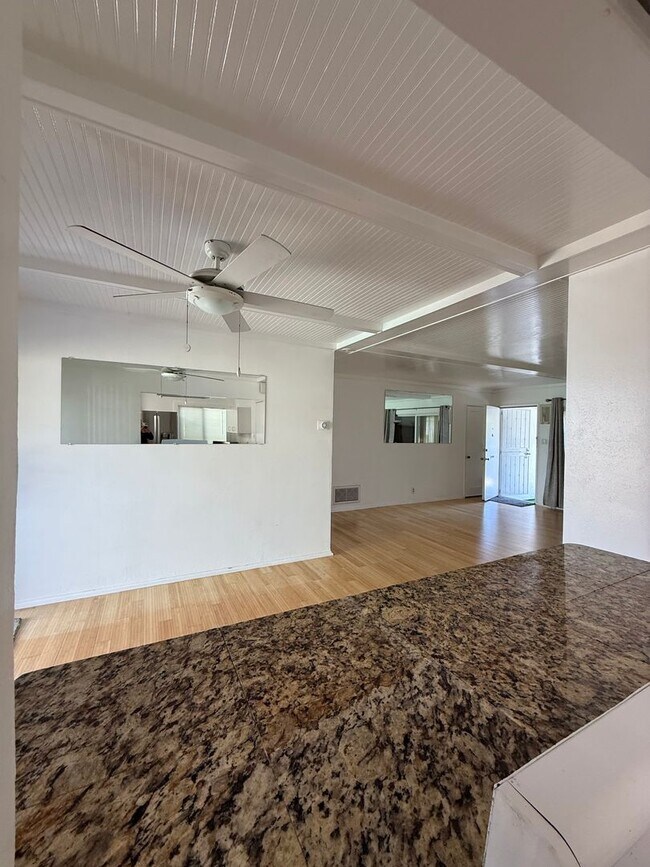 Building Photo - Hard floors, extra closets, patios & fenced yard