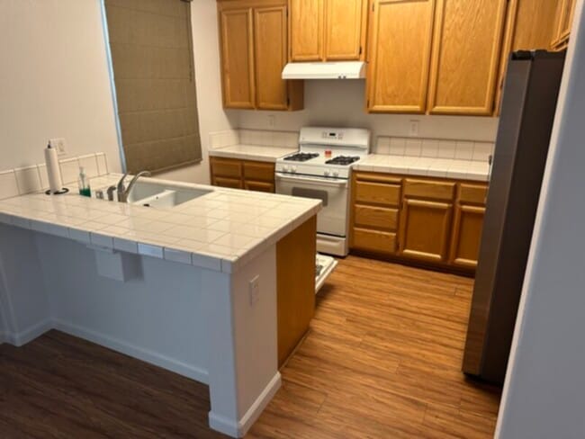 Building Photo - Secure gated community new carpet and paint