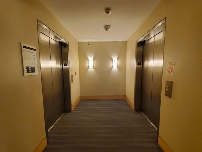 Building Photo - Downtown High-Rise Studio with parking and in-home laundry