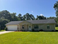Building Photo - 3 Bedroom 2 Bath house with Garage Near Fl...