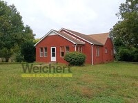 Building Photo - 3BR Home with Basement, Screened Porch & Garage