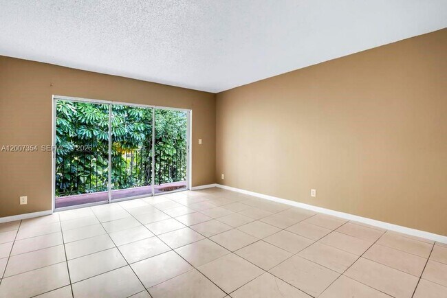 Building Photo - 3100 Coral Springs Dr