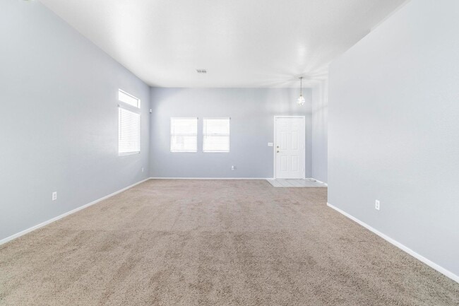 Building Photo - Upgraded 4BR Henderson Home | New Floors | Gated Community | 2-Car Garage