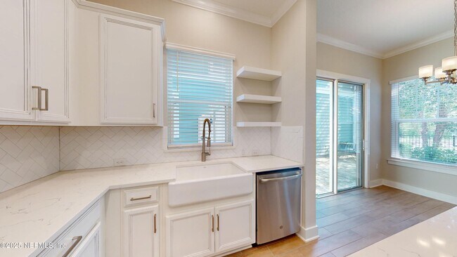 Building Photo - 7430 Beach Walk Place
