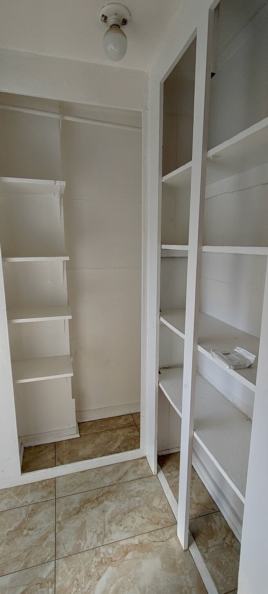Laundry room storage - 1150 Sanborn Ave. Apt C
