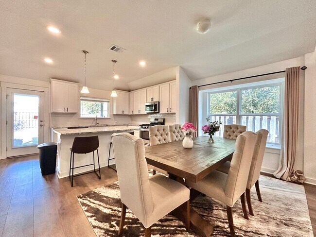 Building Photo - Inviting 4-Bed, 2.5-Bath Home with High Ceilings and Covered Deck