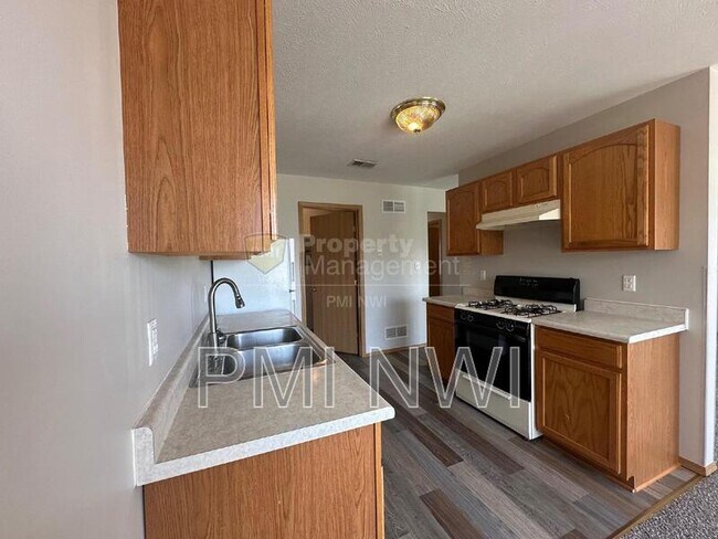 Building Photo - 1510-1516-1516 W 86th Ln