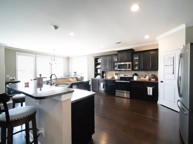 Building Photo - Elegant Richmond Hill Home with Screened Patio & Lagoon Views