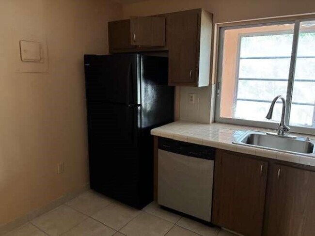 Building Photo - 9401 Lime Bay Blvd