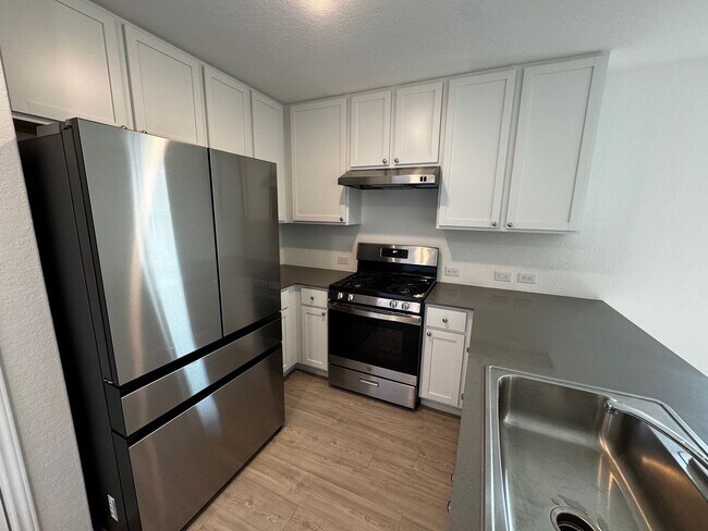 Building Photo - MOVE-IN SPECIAL! Modern 2024 New-Build with Open-Concept Living and Private Primary Suite in Wate...