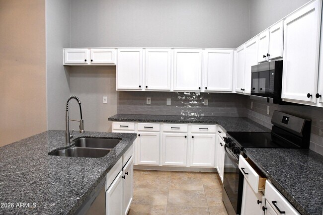 Building Photo - 8787 W Gardenia Ave