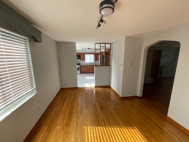 View from dining room into kitchen. - 1630 Fiat St