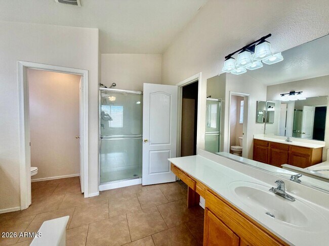 Building Photo - 9323 W Harmony Ln