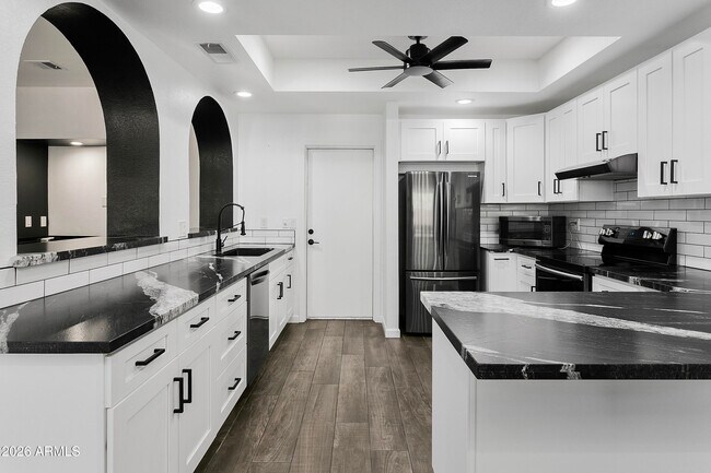 Building Photo - 1610 N Stapley Dr