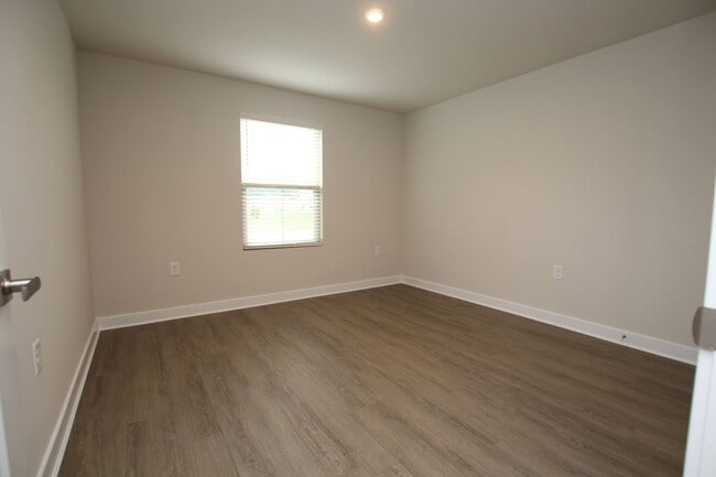 Building Photo - Maintenance Free Living in this Brand New ...