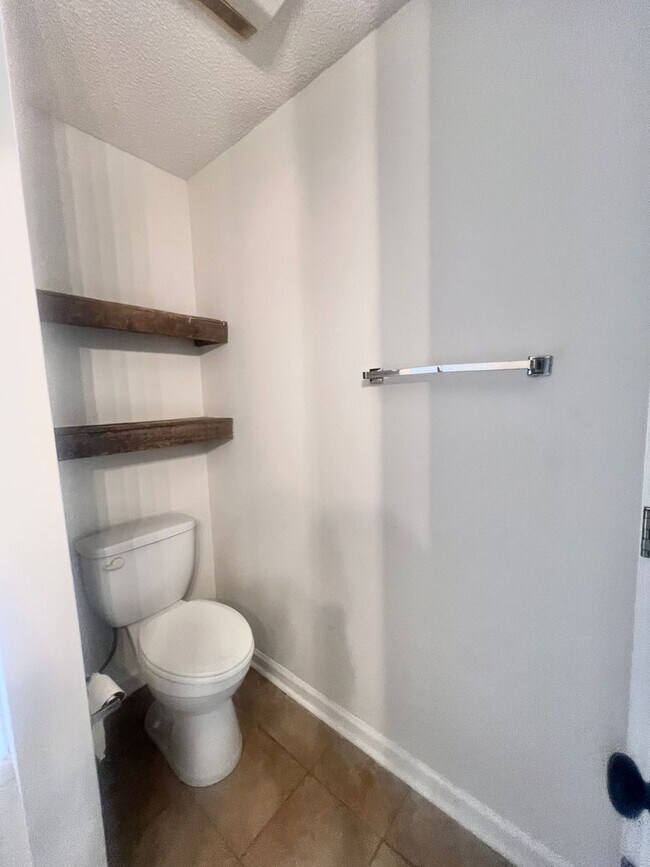 Building Photo - RENT SPECIAL! Freshly Painted! New Luxury ...