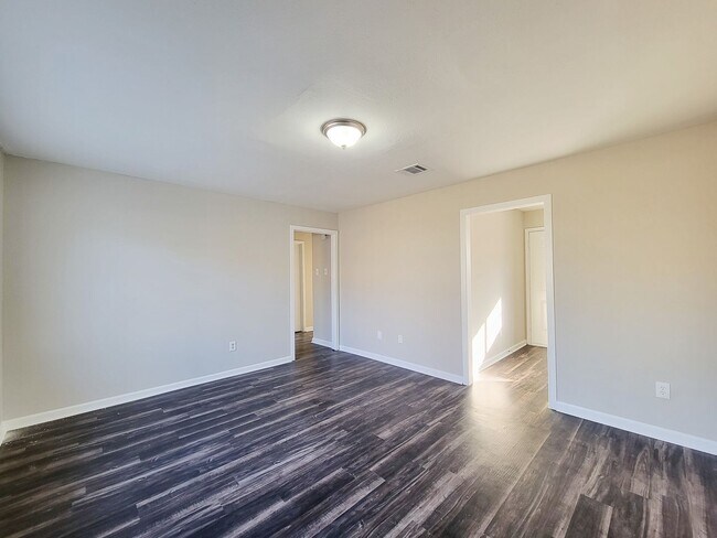 Building Photo - REMODELED/ UPDATED 4 BEDROOM 2 BATH WITH C...